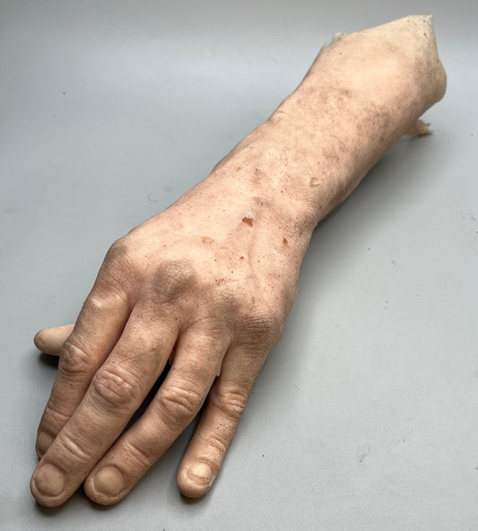 Man's left hand and arm